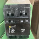 Square Homeline HOMT230250CP 50AMP/30AMP 240V Tandem Quad Circuit Breaker. Fixed Price $64.99.